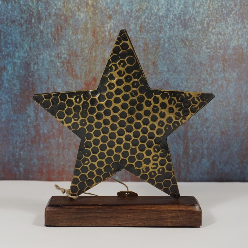 schwarz-goldfarbener Stern auf Holzsockel (22cm)