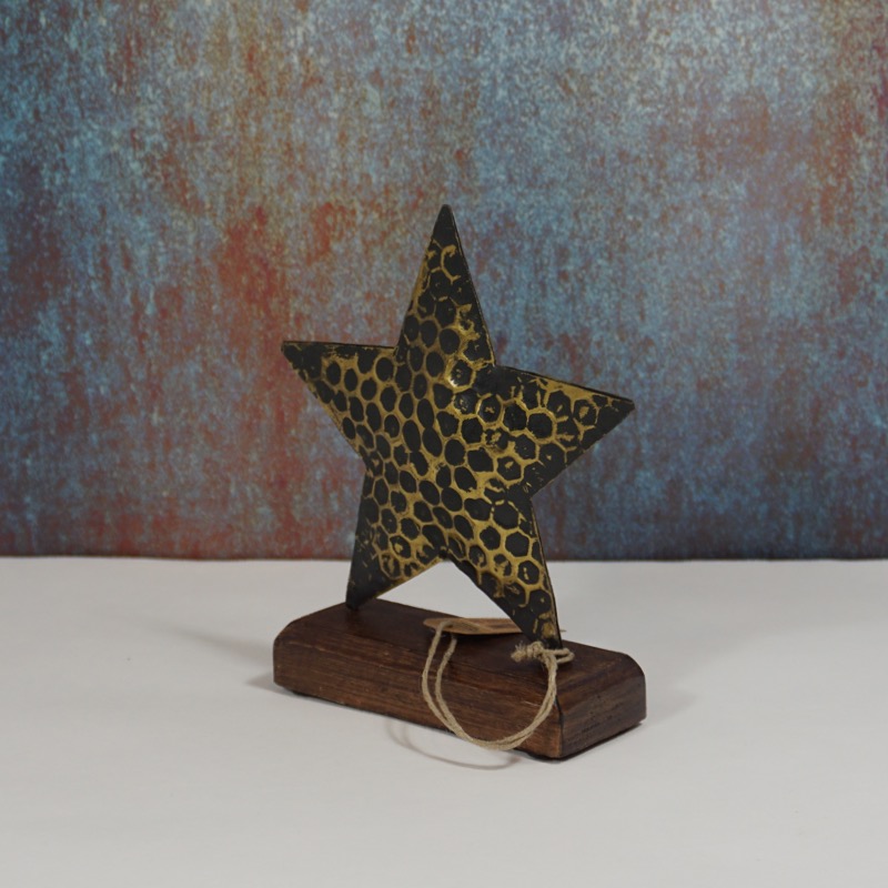 schwarz-goldfarbener Stern auf Holzsockel (17cm)