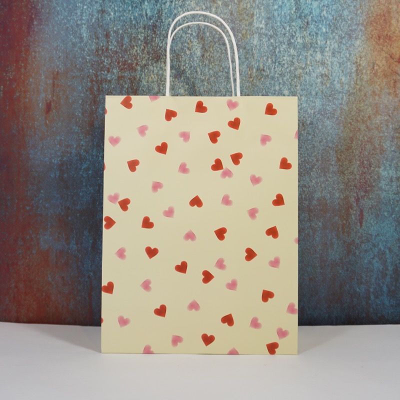 Geschenktüte mit Herzmotiv (beige)